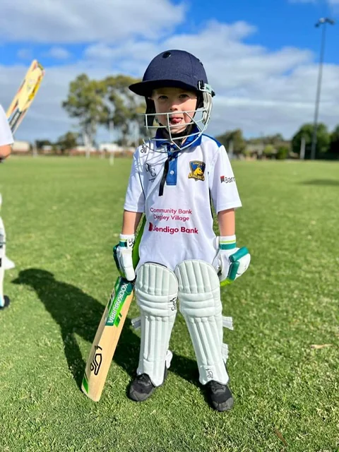 Young Dingley player in batting gear