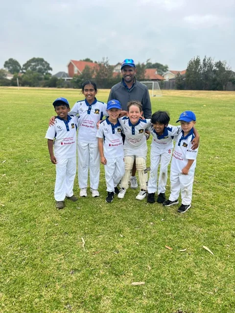 Young Dingley players with a coach