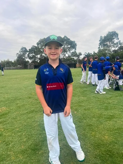 Dingley junior player on the oval